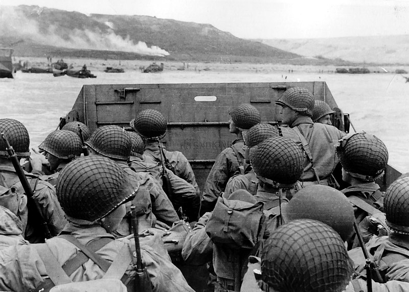 Young soldiers on transport about to storm Normandy Beach, June 6th, 1944.